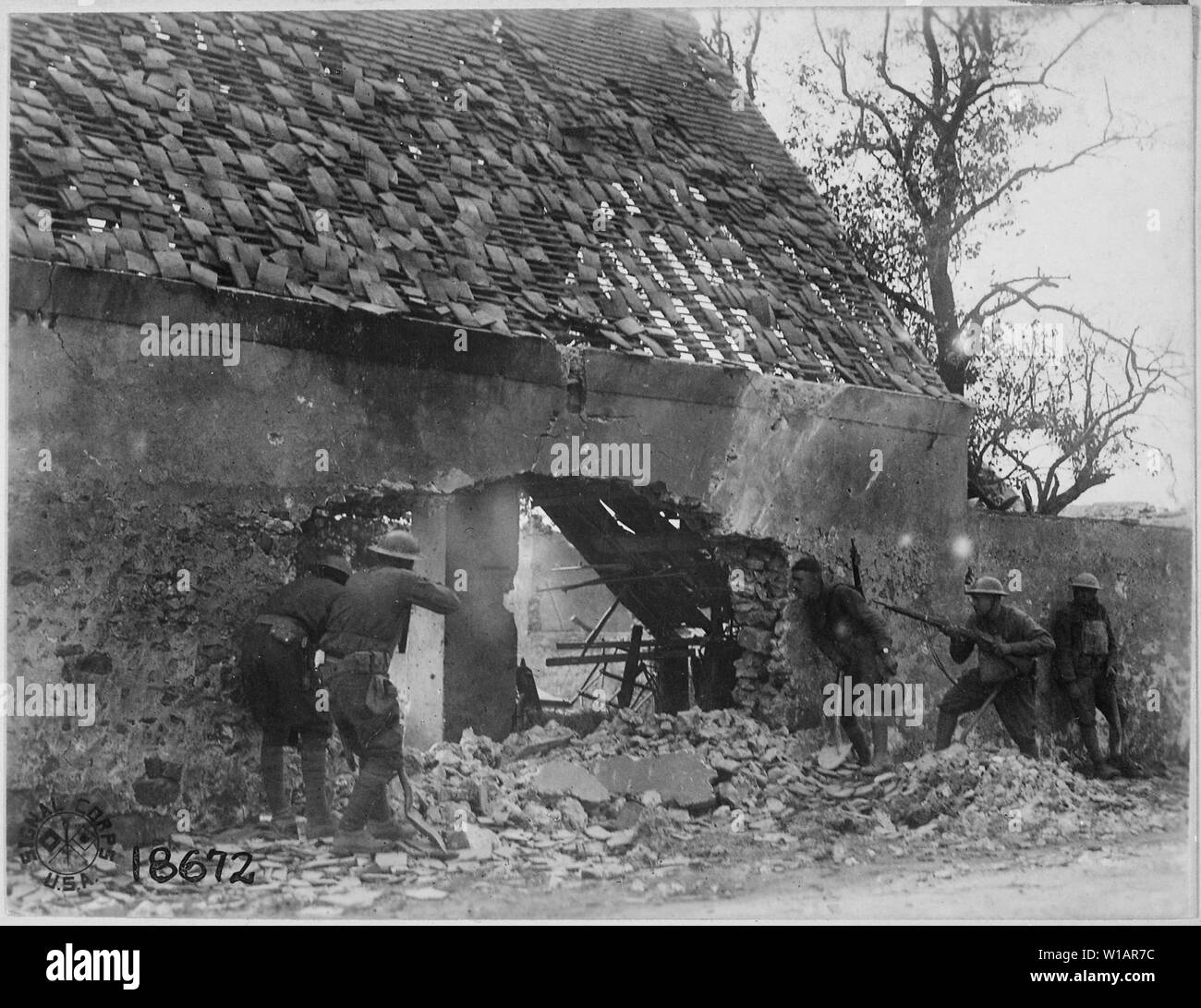 American snipers of the 166th Infantry (formerly 4th Infantry, Ohio National Guard), in nest picking off Germans on the outer edge of town. Villers sur Fre, France., 07/30/1918; General notes:  Use War and Conflict Number 615 when ordering a reproduction or requesting information about this image. Stock Photo