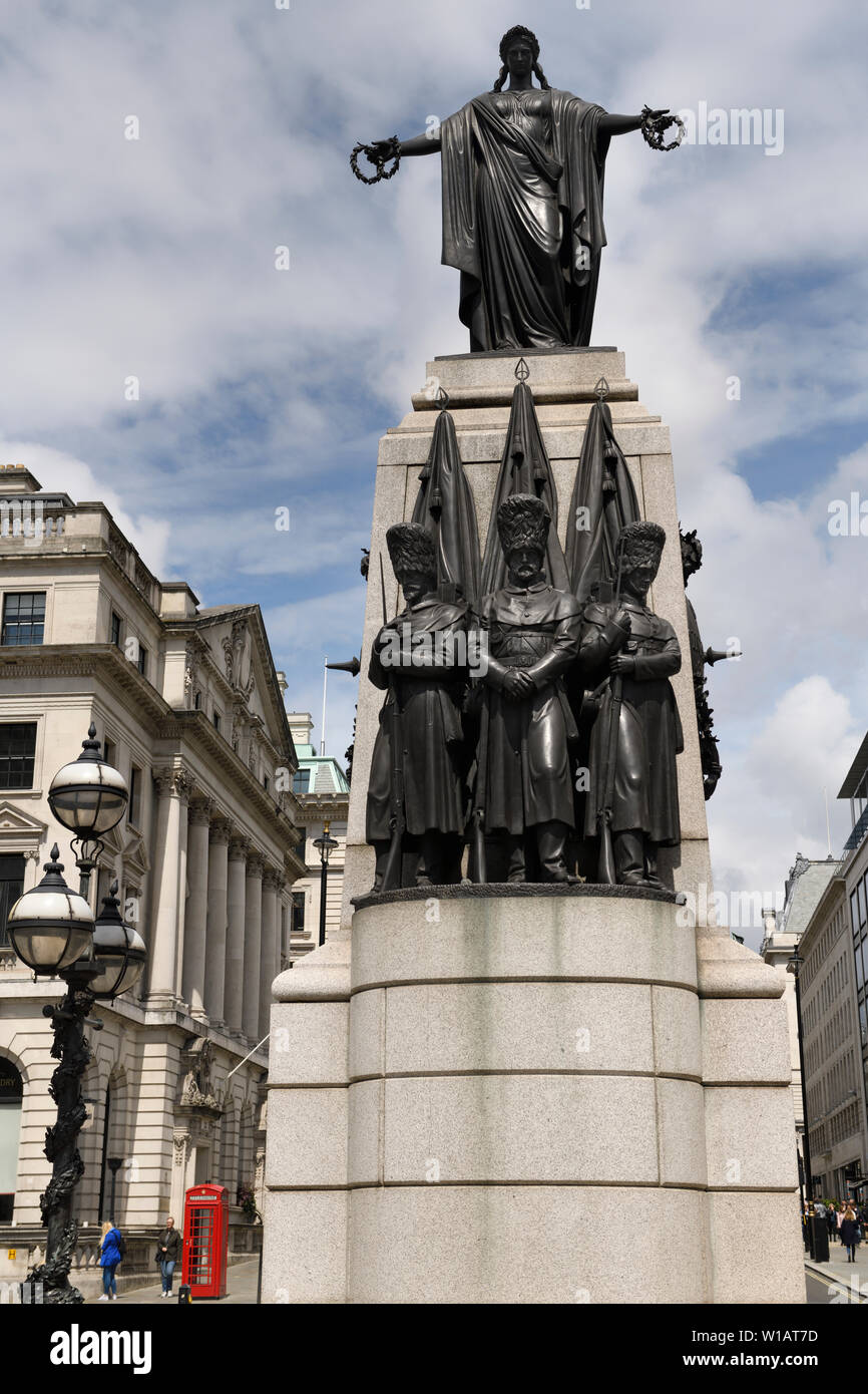 Crimean War Memorial at Waterloo Place at Regent Street and Pall Mall with bronze sculpture of three Guardsmen and female for victory London England Stock Photo