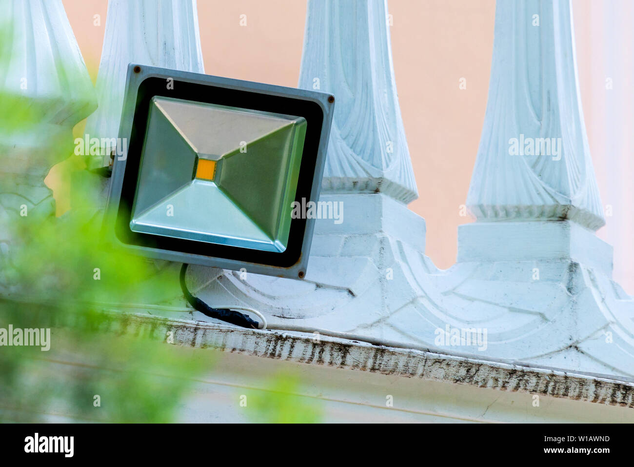 LED flood light, spotlight on wall. Safety concept Stock Photo