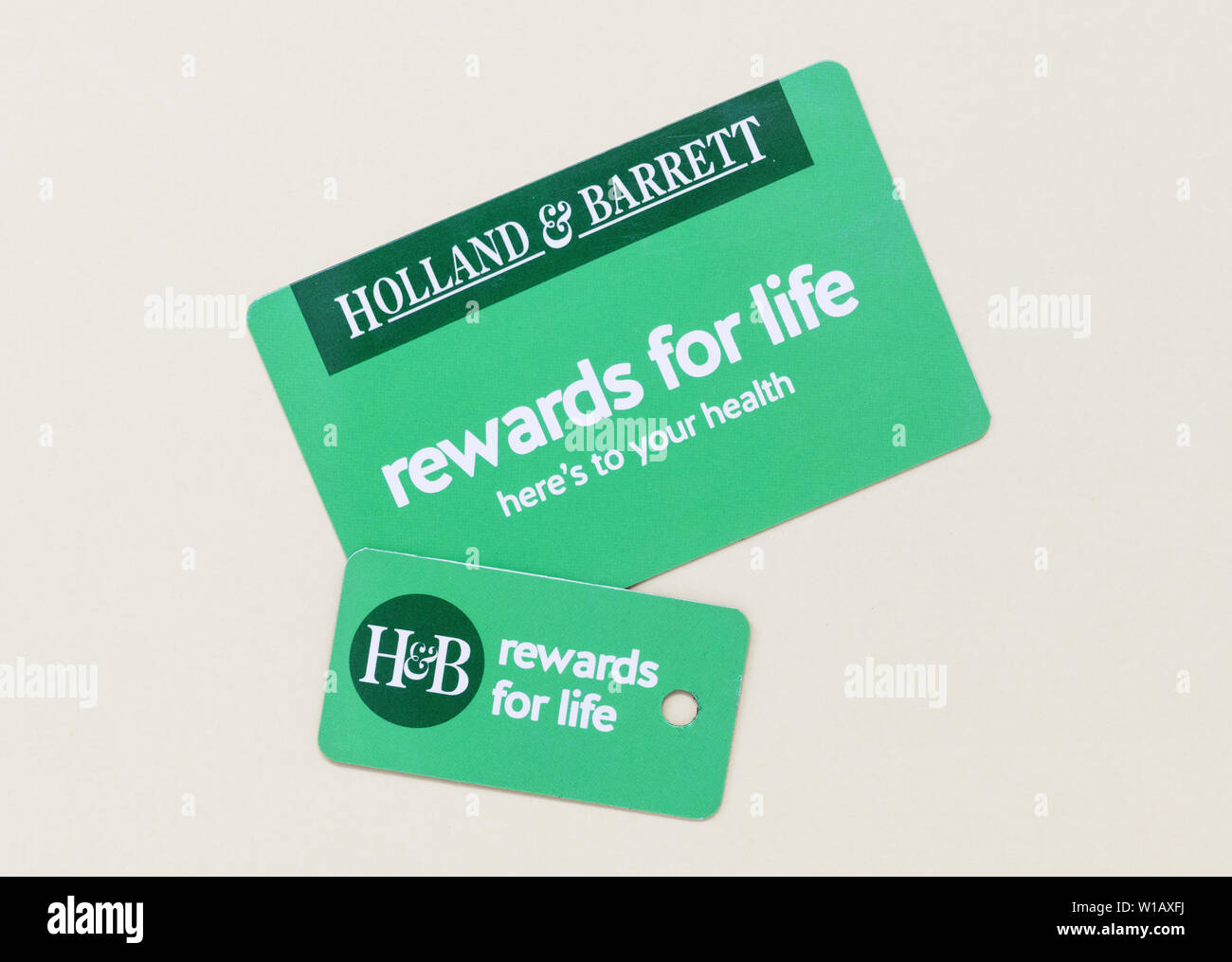 London / UK - July 1st 2019 - Holland and Barrett customer rewards card and key fob. Holland & Barrett is a chain of health food shops with over 1,300 Stock Photo