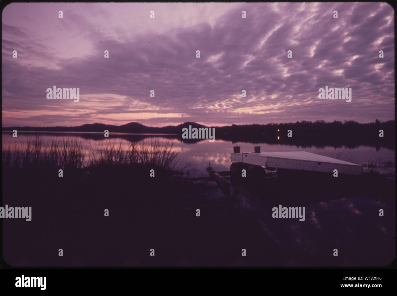 BASS LAKE YEARROUND AND VACATION HOMES SURROUND THIS SMALL, SCENIC