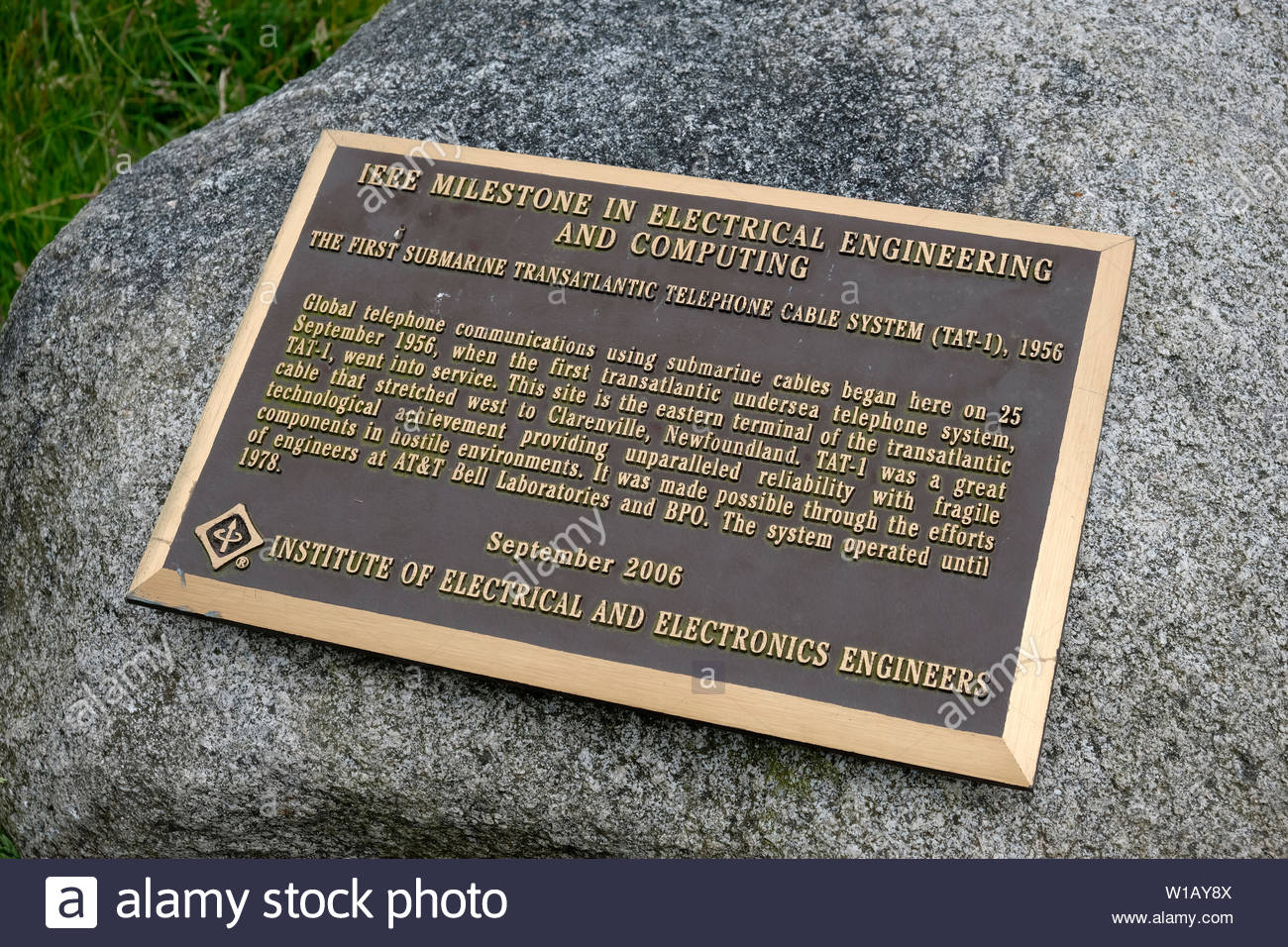 Plaque situated on the Island of Kerrera Scotland, commemorating the laying of the first submarine transatlantic telephone cable system TAT-1 Stock Photo