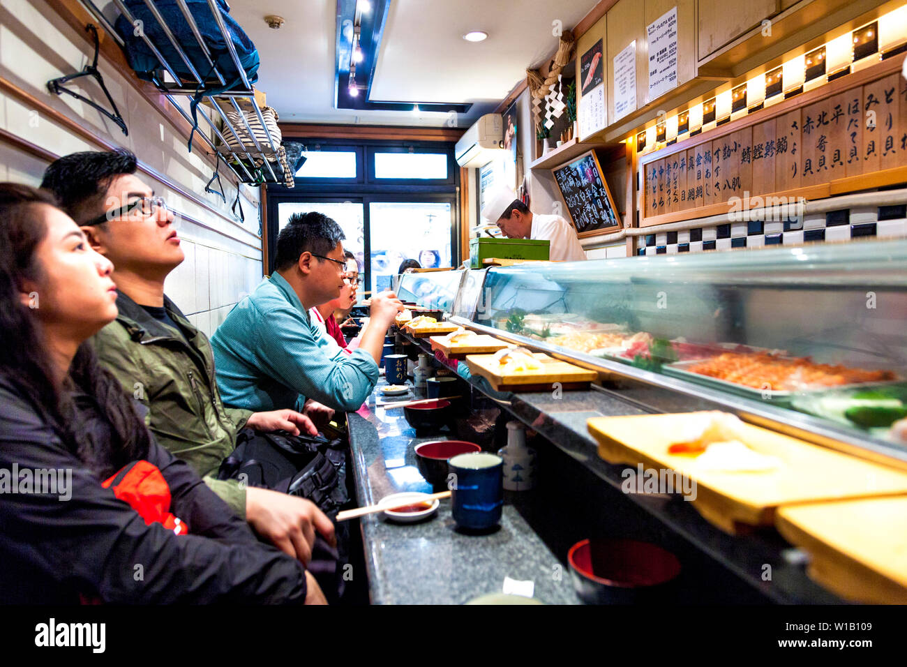 Tsukiji fish market sushi restaurant hires stock photography and