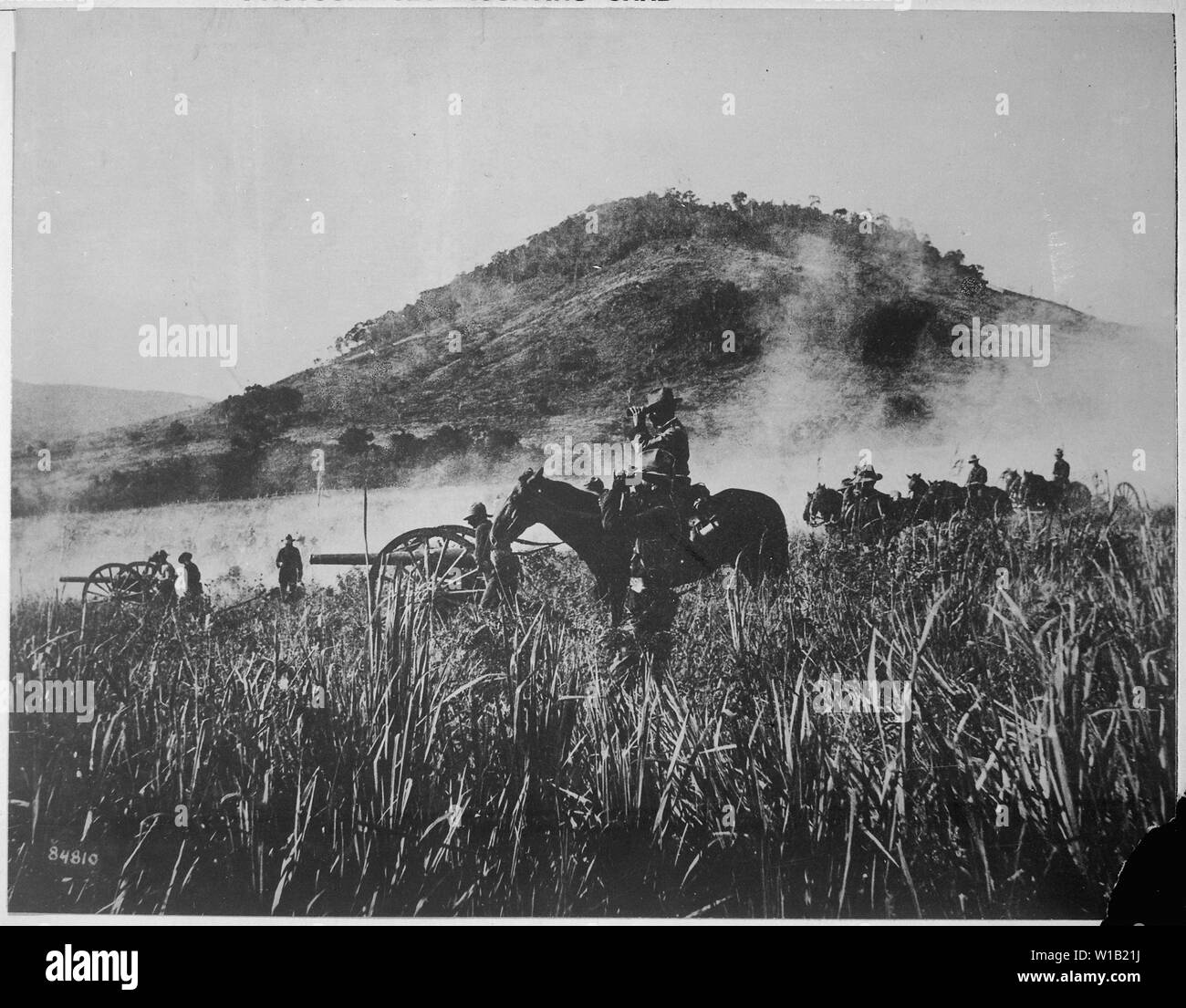 Battery B, 4th Artillery, shelling the blockhouse at Coamo, Porto Rico., 08/09/1898; General notes:  Use War and Conflict Number 295 when ordering a reproduction or requesting information about this image. Stock Photo