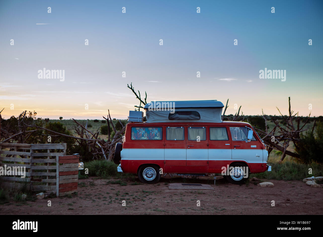 Dodge A100 vintage camper van raised roof Alternative Eco friendly Campground Glamping 'The Nest' in Williams, Arizona, USA, near the Grand Canyon Stock Photo