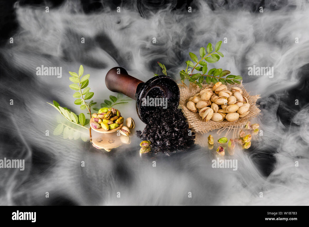 Hookah bowl with tobacco in the smoke. Pistachio shisha tobacco Stock Photo Alamy