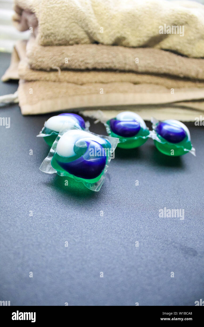 Laundry Day laundry detergent pods on a laundry folding table with