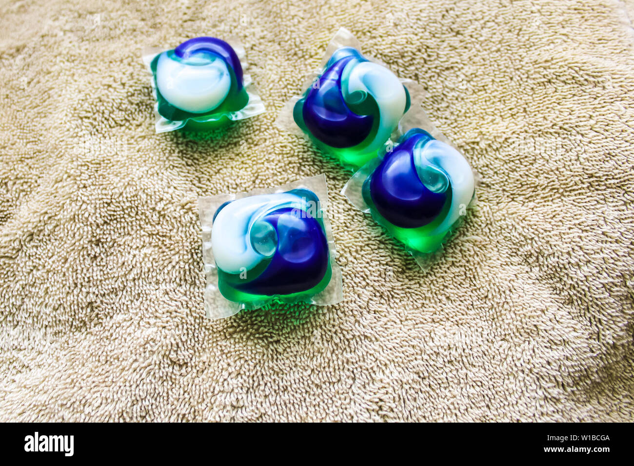 Laundry Day laundry detergent pods on a laundry folding table with