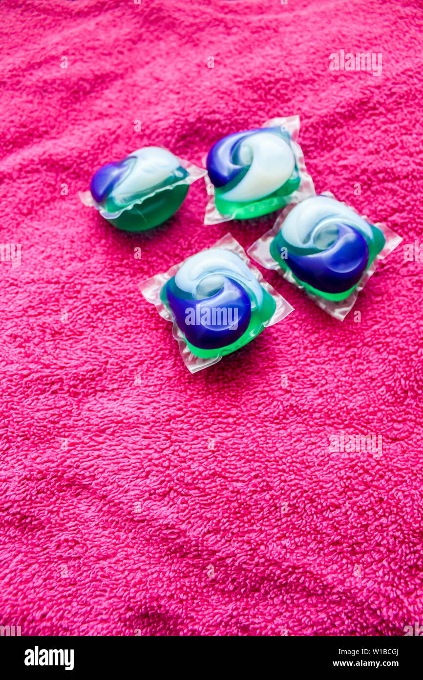 Laundry Day laundry detergent pods on a laundry folding table with