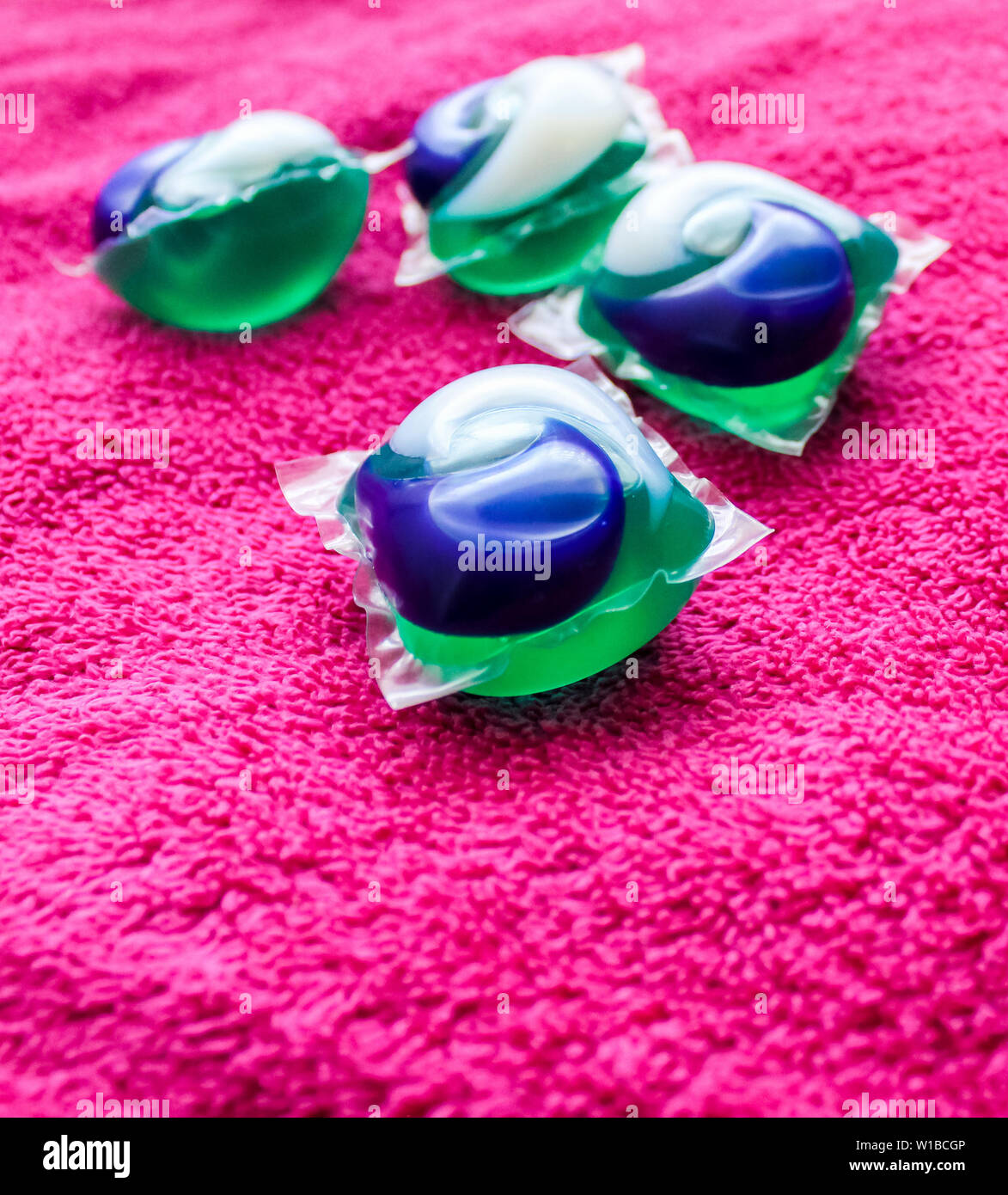 Laundry Day laundry detergent pods on a laundry folding table with