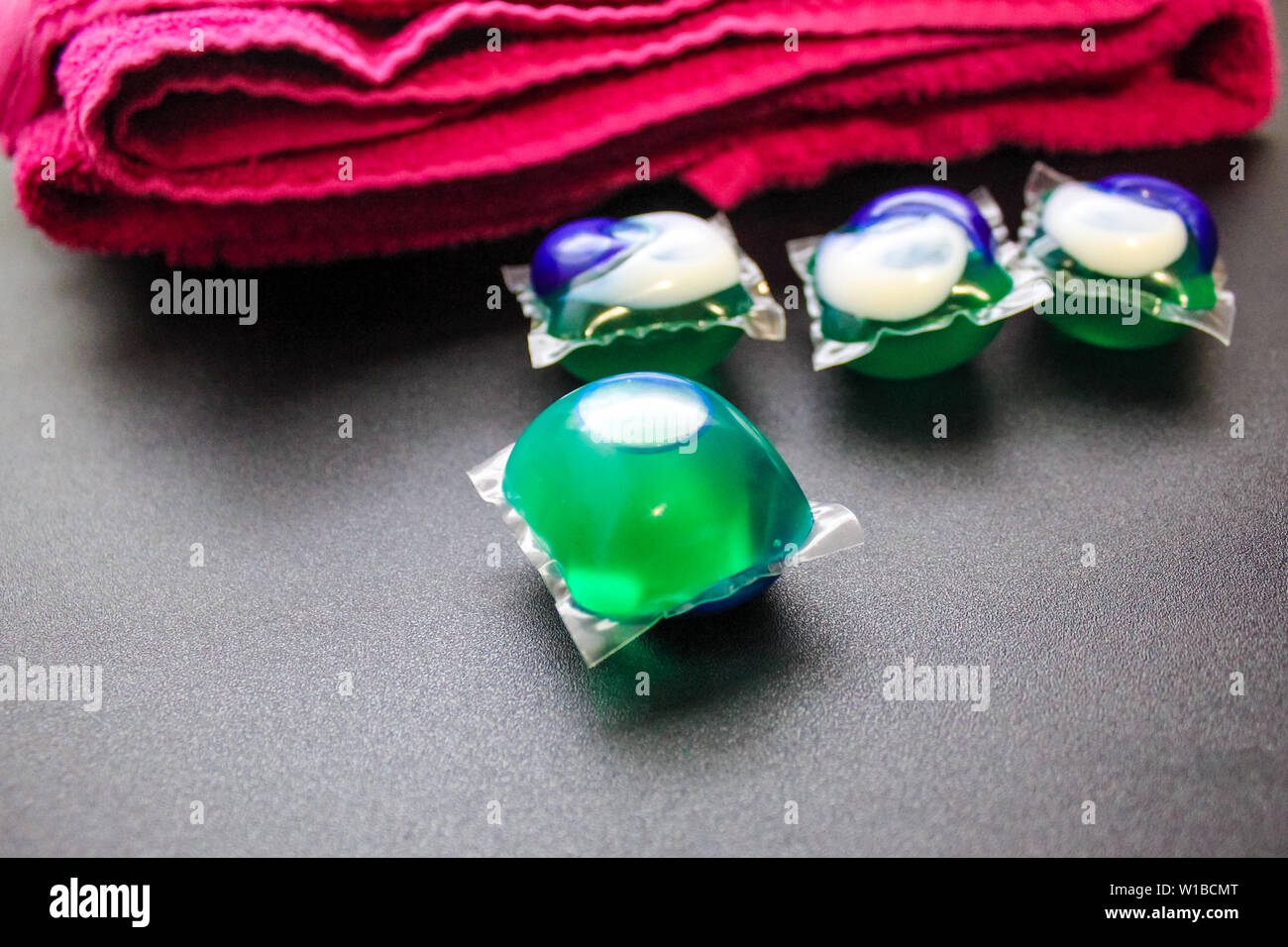 Laundry Day laundry detergent pods on a laundry folding table with