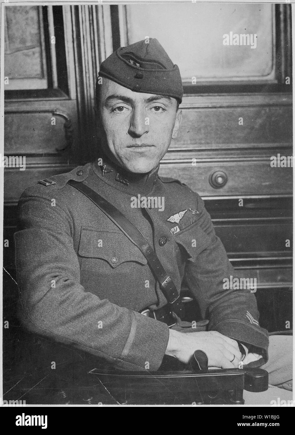 Captain Edward Rickenbacker, America's premier Ace officially credited with 22 enemy planes and the proud wearer of the French War Cross as he appeared upon his arrival on board the Adriatic. Underwood and Underwood., ca. 1919; General notes:  Use War and Conflict Number 496 when ordering a reproduction or requesting information about this image. Stock Photo