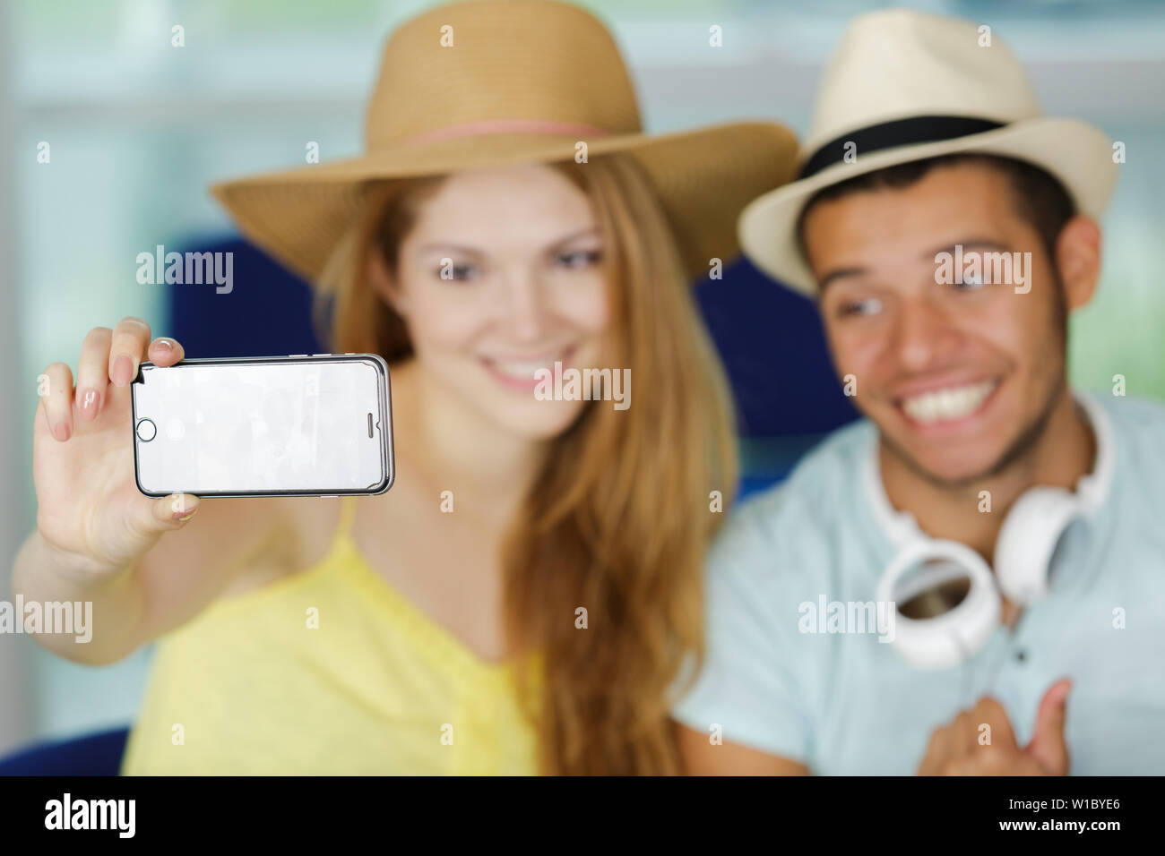a young couple taking selfies Stock Photo