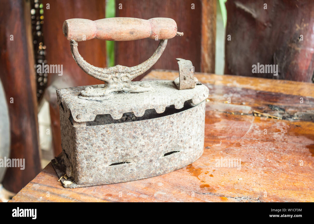 Old charcoal irons Stock Photo Alamy