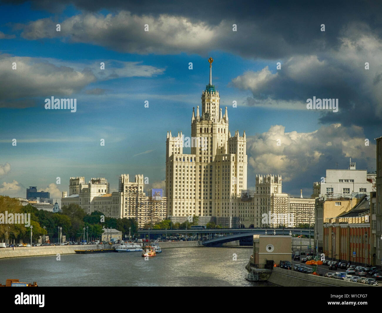 Kotelnicheskaya Embankment Building is one of seven stalinist skyscrapers also known as Seven Sisters. View from Bolshoy Moskvoretskiy Bridge. Stock Photo