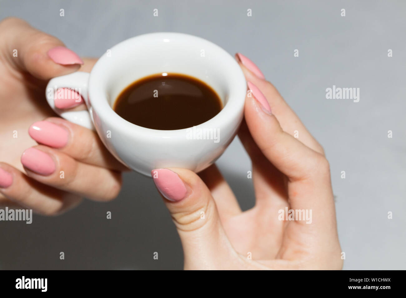 Taking the neapolitan coffee in ceramic cup Stock Photo