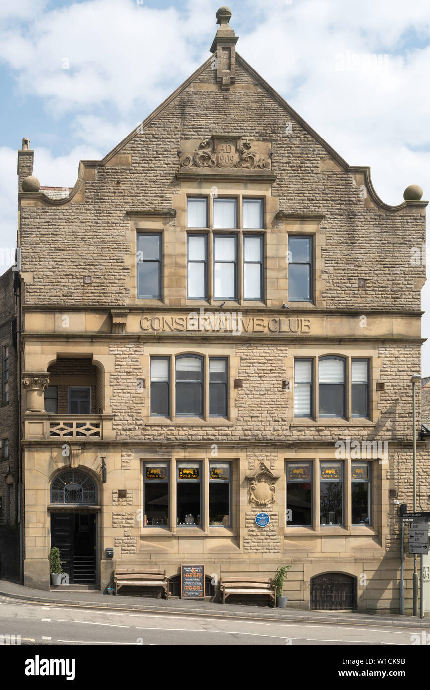 The old Conservative Club building, now Harvey Leonards Wine & Ale shop, in Glossop, Derbyshire, England, UK Stock Photo