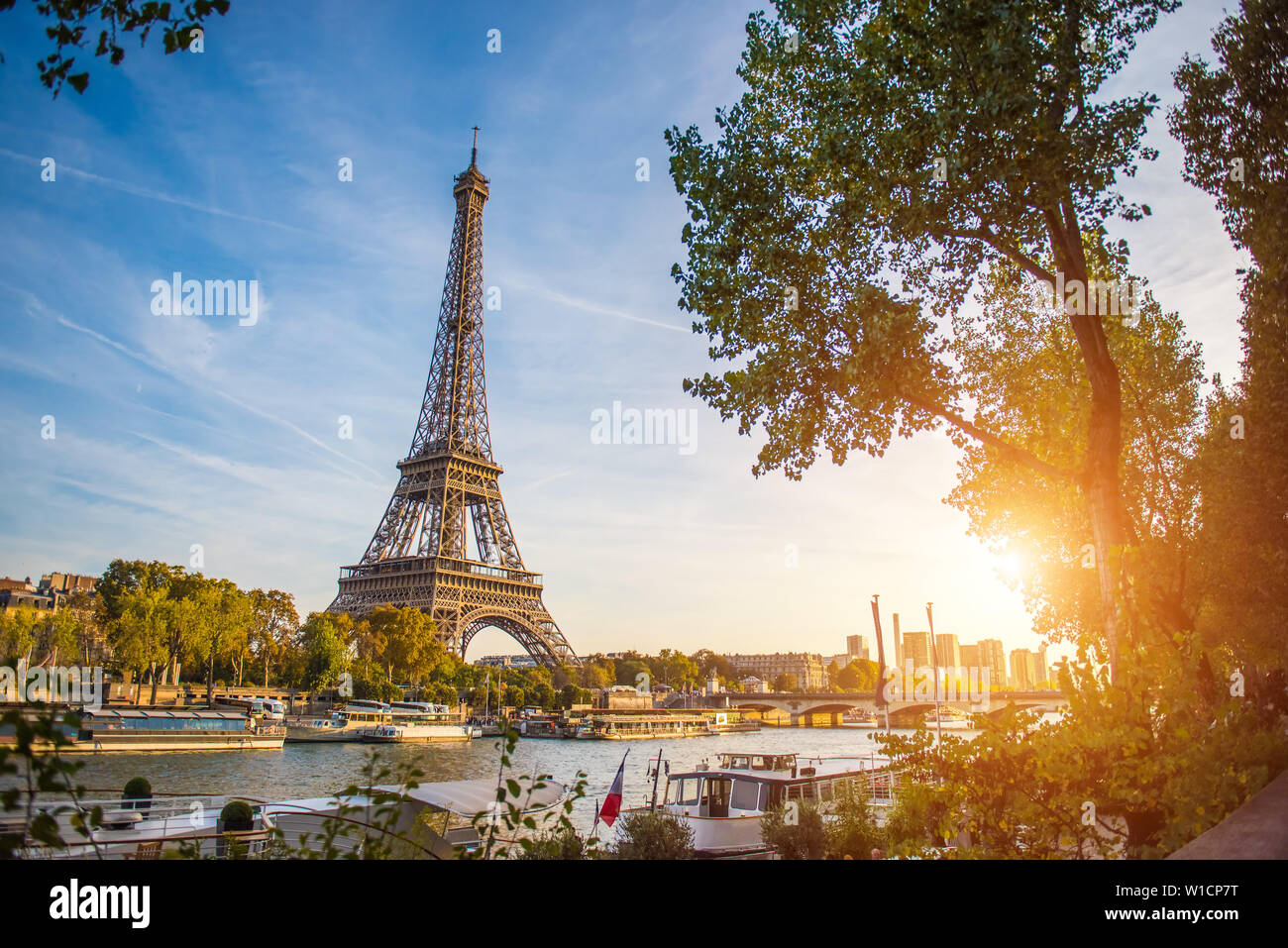 Sunset view of Eiffel tower and Seine river in Paris, France. Architecture and landmarks of Paris. Postcard of Paris Stock Photo