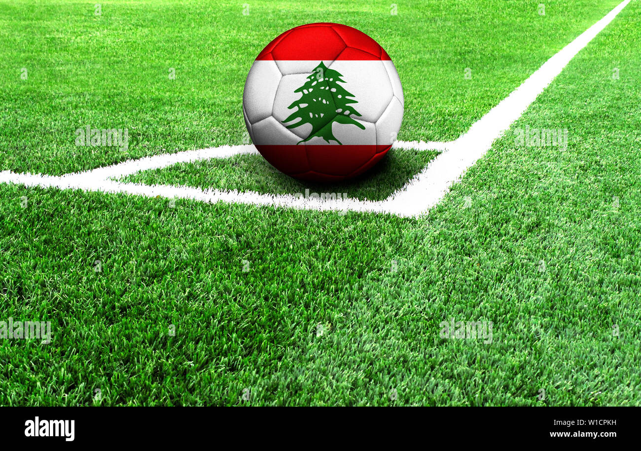 soccer ball on a green field, flag of Lebanon Stock Photo Alamy