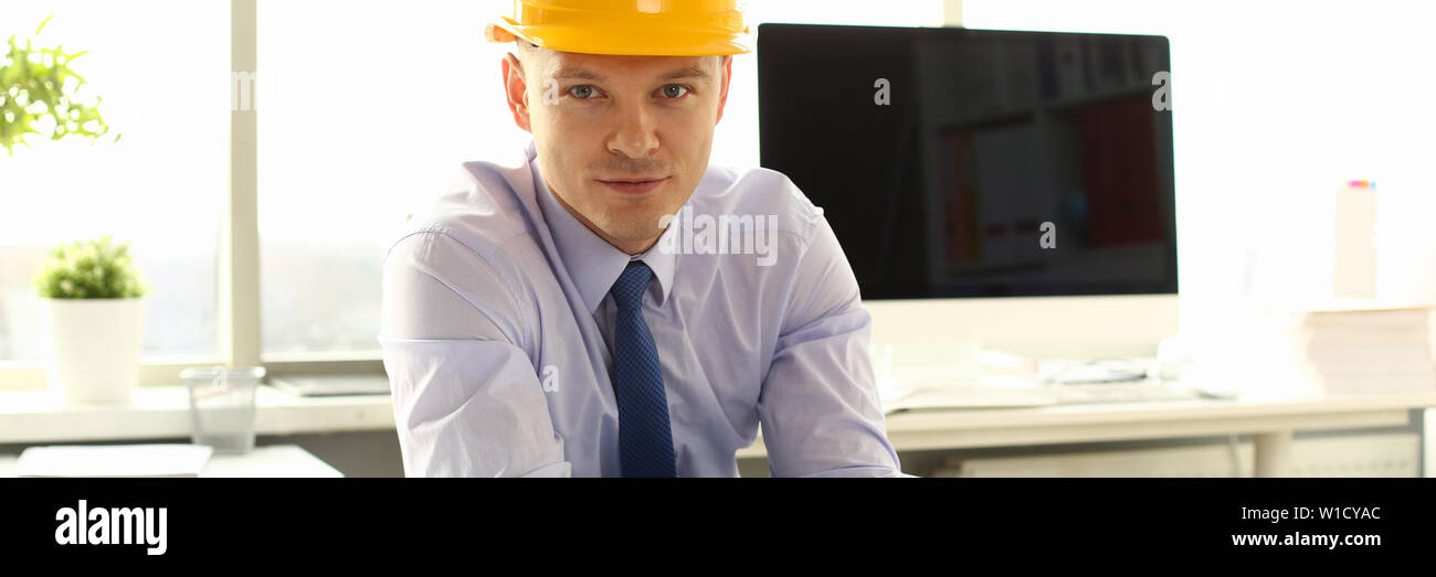 Young Architect Freelance Man Working on Blueprint Stock Photo