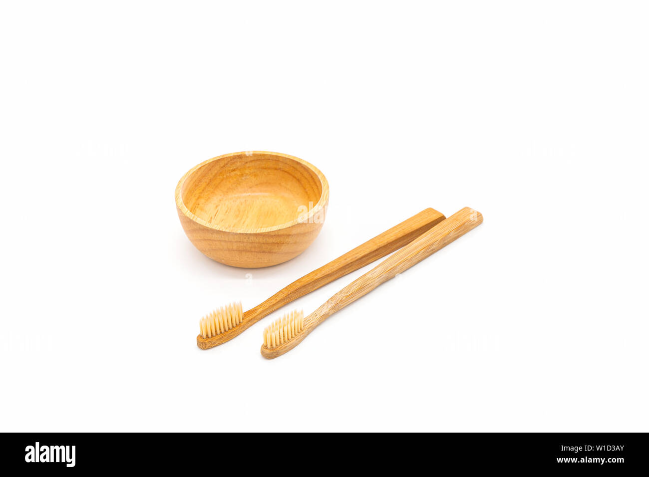 Close up bamboo toothbrush on white background Stock Photo - Alamy