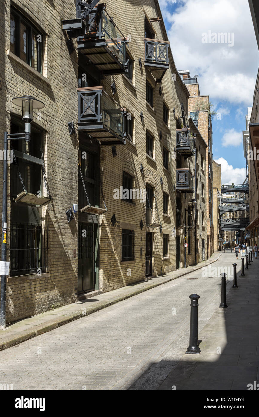 Shad Thames is a historic riverside street next to Tower Bridge in Bermondsey and is also an informal name for the surrounding area in London Stock Photo