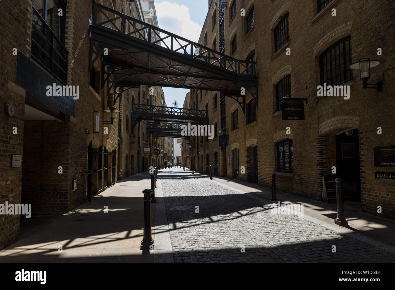 Shad Thames is a historic riverside street next to Tower Bridge in Bermondsey and is also an informal name for the surrounding area in London Stock Photo