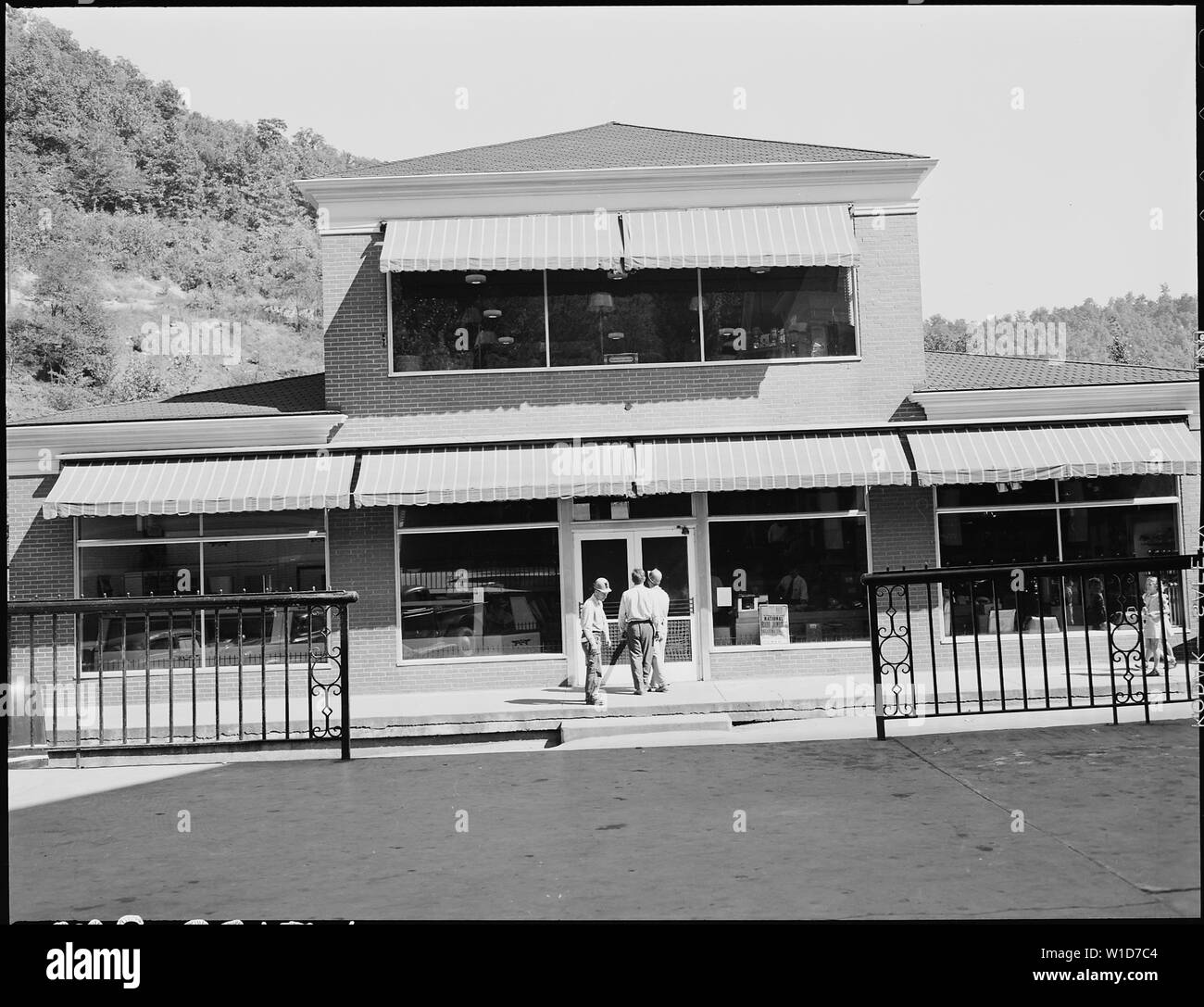 Front of general store which has grocery, hardware and furniture
