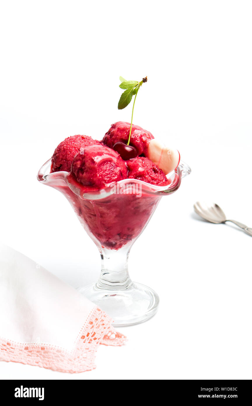 Cherry ice cream scoops in a cup on white Stock Photo Alamy