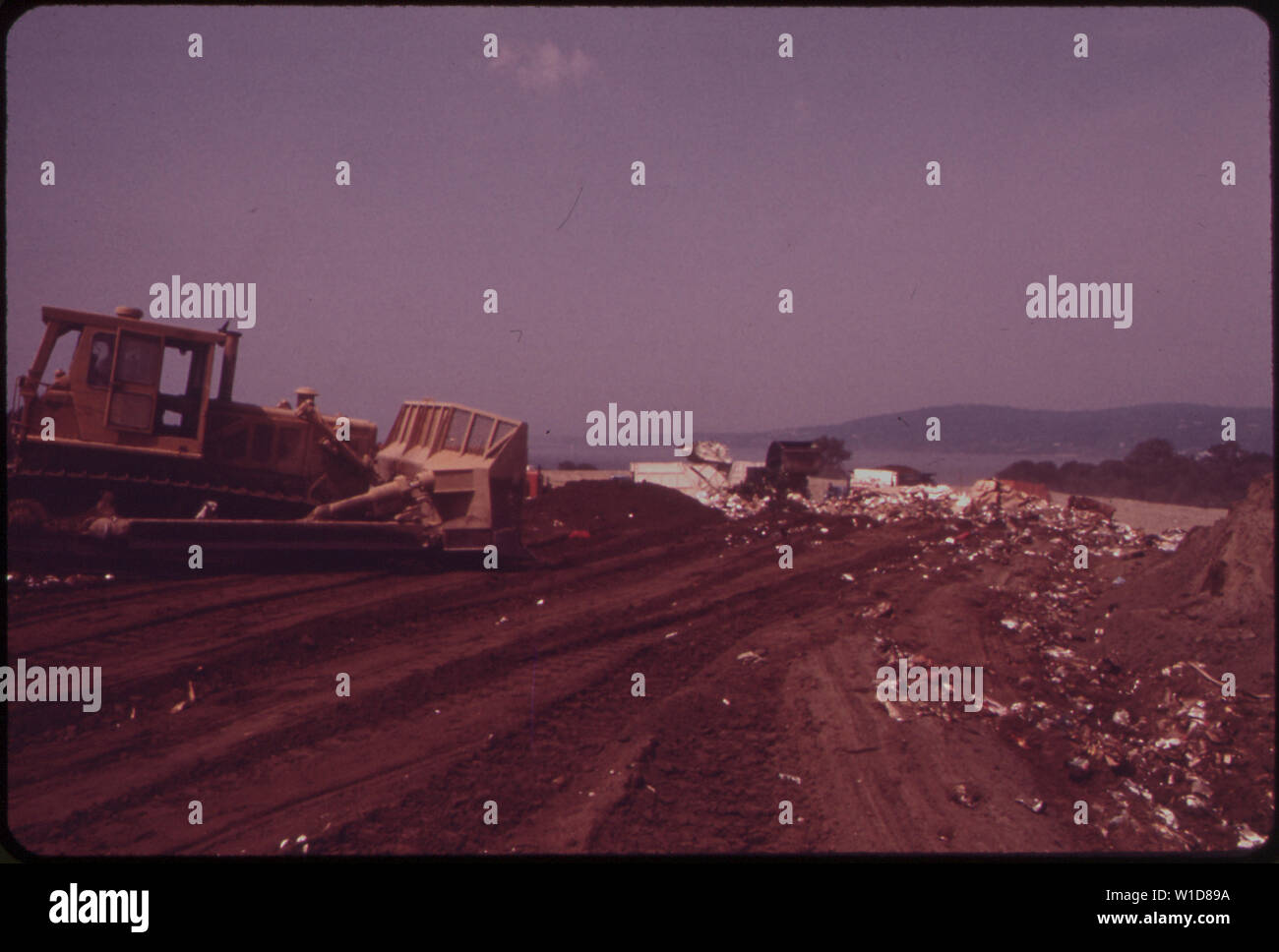 GARBAGE IS COVERED BY ONE FOOT OF EARTH IN CROTON LANDFILL OPERATION