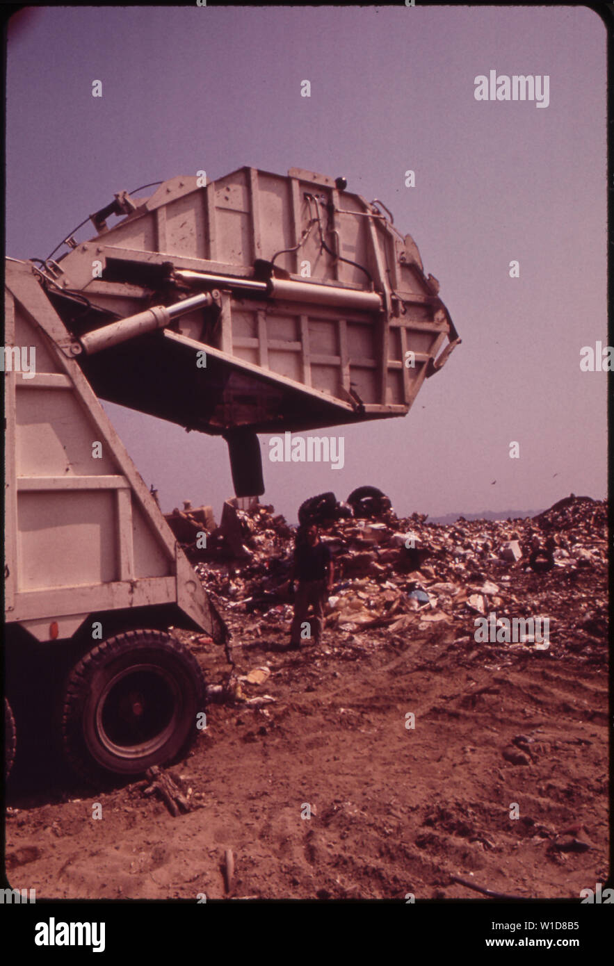 GARBAGE TRUCK AT CROTON LANDFILL OPERATION ALONG THE HUDSON RIVER Stock