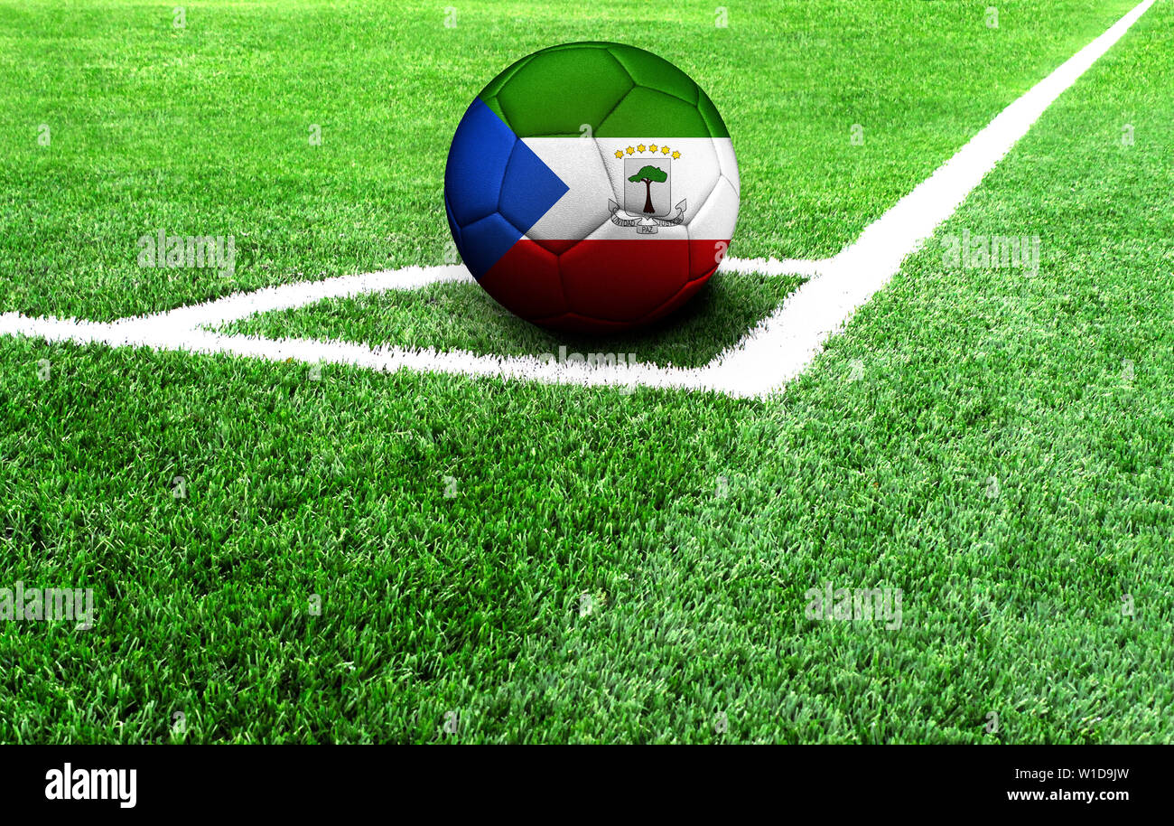 soccer ball on a green field, flag of Equatorial Guinea Stock Photo