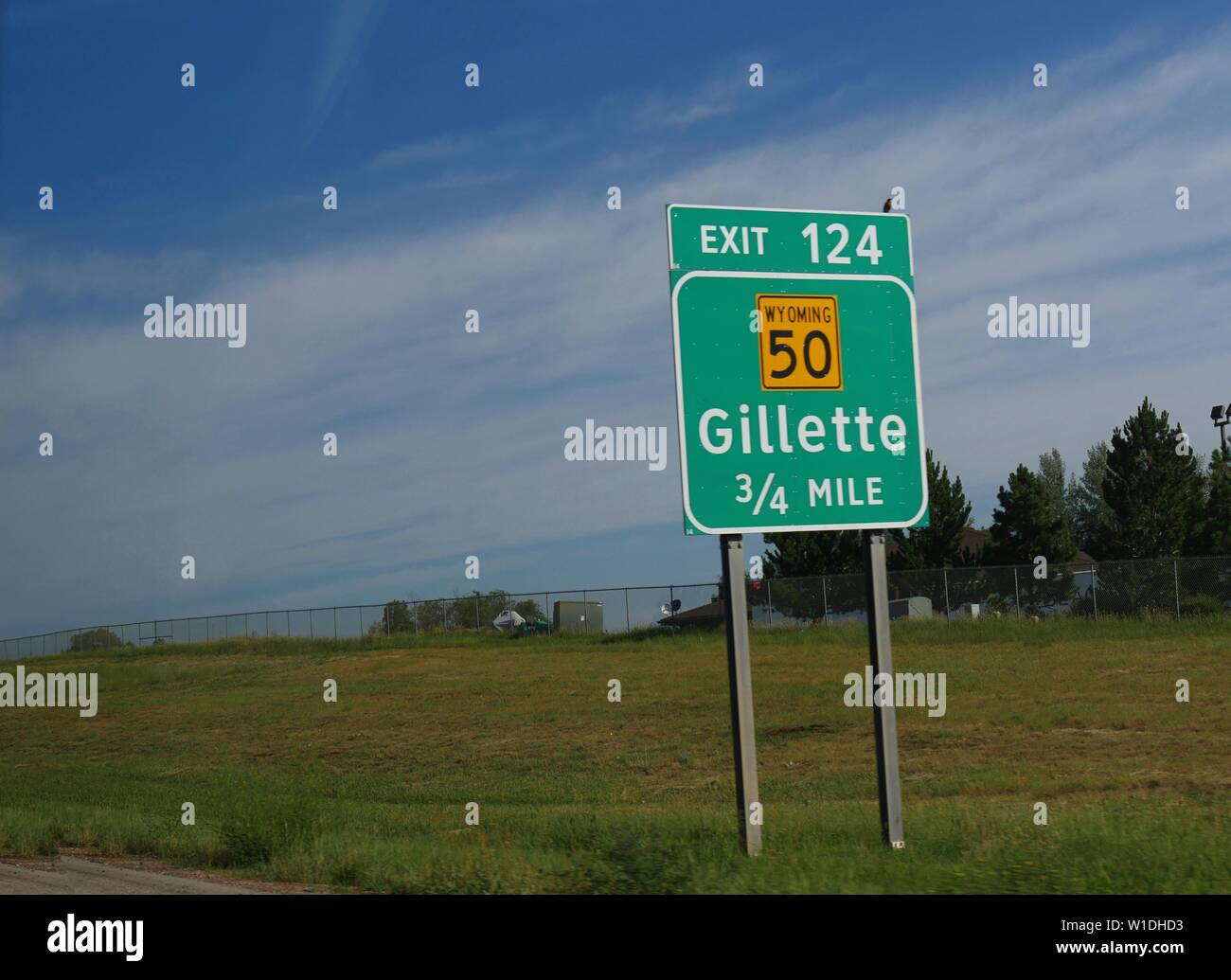 Roadside sign with distance to the city of Gillette, Wyoming Stock