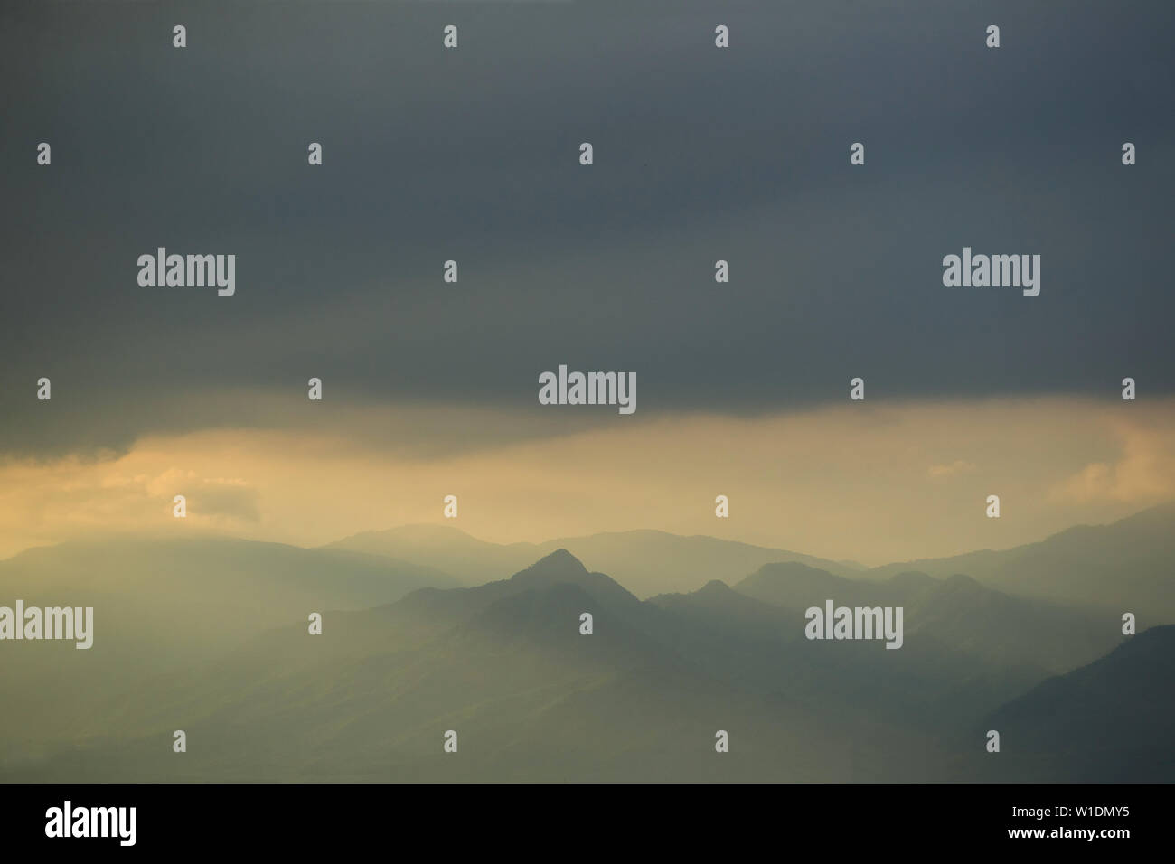 Cloud and fog floating cover mountain in sunny day Stock Photo