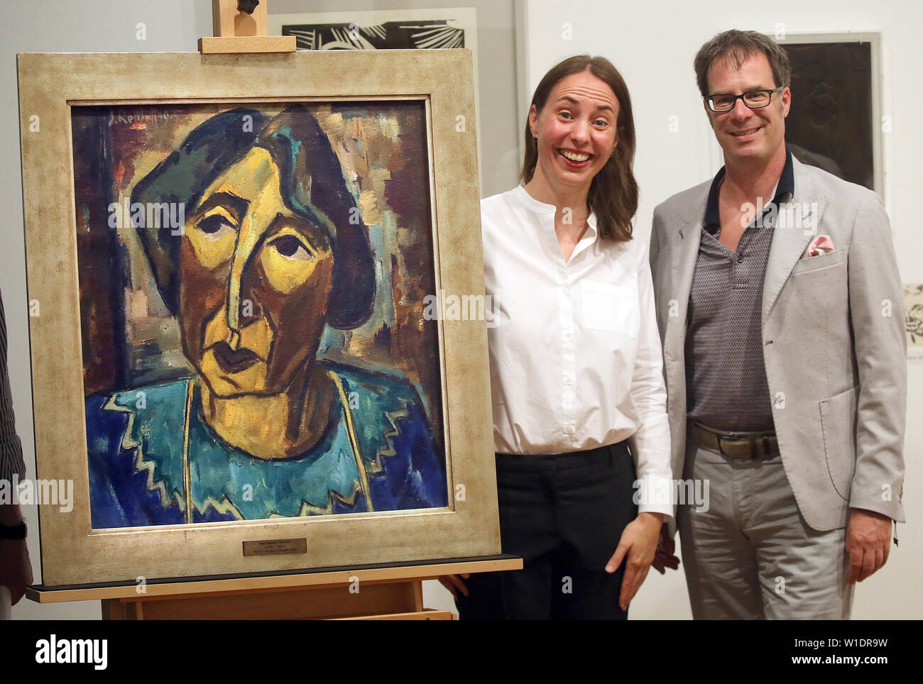 Berlin, Germany. 02nd July, 2019. Lisa Marei Schmidt, Director of the Brücke Museum, and Martin Hoernes, Secretary General of the Ernst von Siemens Kunststiftung, present the new acquisition for the Brücke Museum, the important painting 'Portrait R.S. (Rosa Schapire)' by Karl Schmidt-Rottluff. Credit: Wolfgang Kumm/dpa - ATTENTION: Only for editorial use in connection with the current reporting/dpa/Alamy Live News Stock Photo