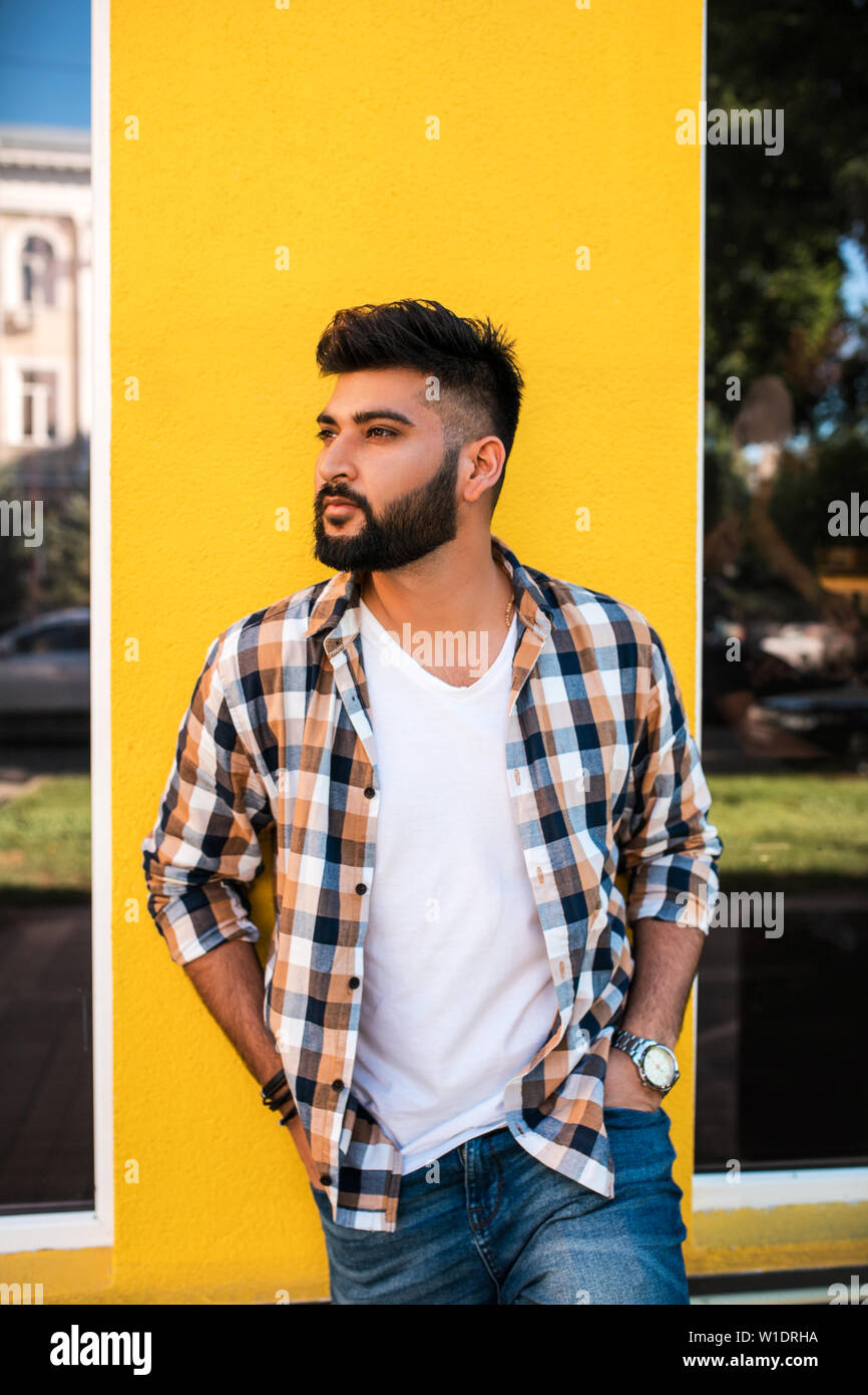 Handsome young indian man posing at street Stock Photo - Alamy Handsome young indian man posing at street Stock Photo - Alamy