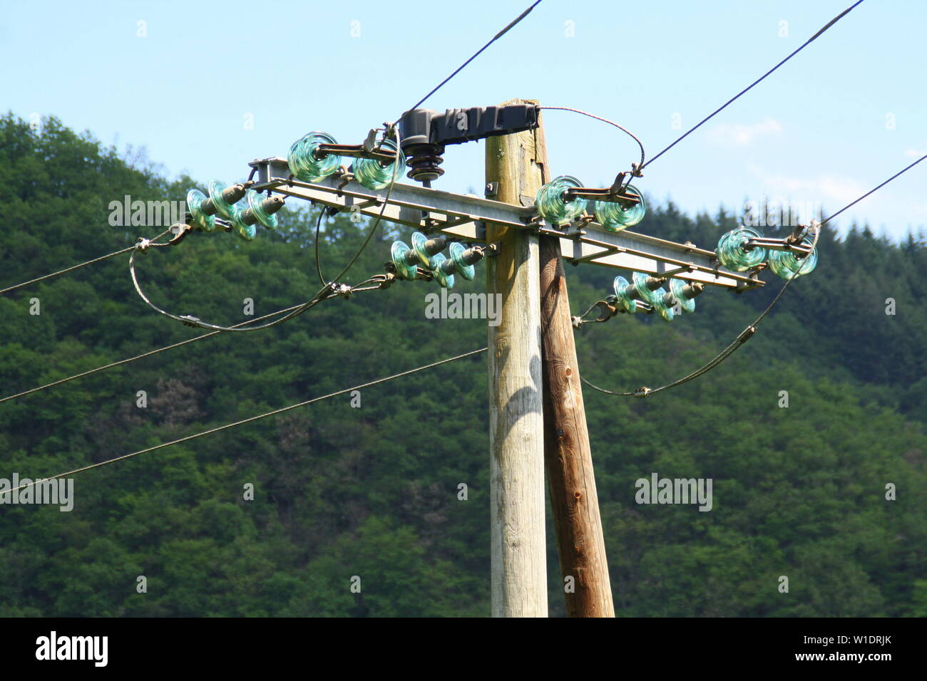Wooden poles and electric wires and telephone wires Stock Photo - Alamy