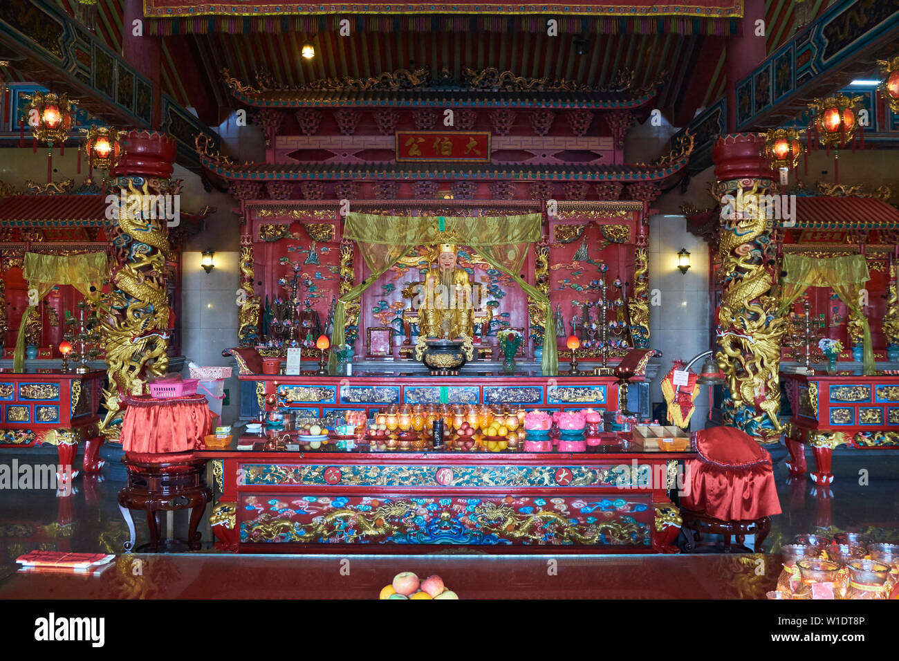 Interior view of the central altar at Tua Pek Kong Chinese temple in Bintulu, Borneo, Malaysia. Stock Photo