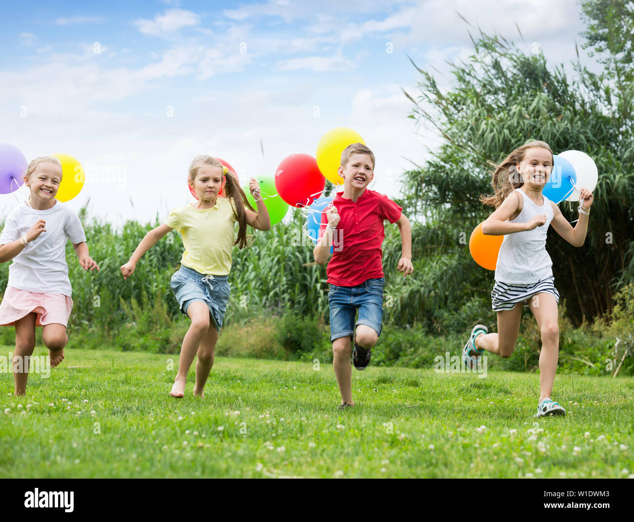 Running Happyly Girl happily running outdoors hi-res stock photography and images - Alamy