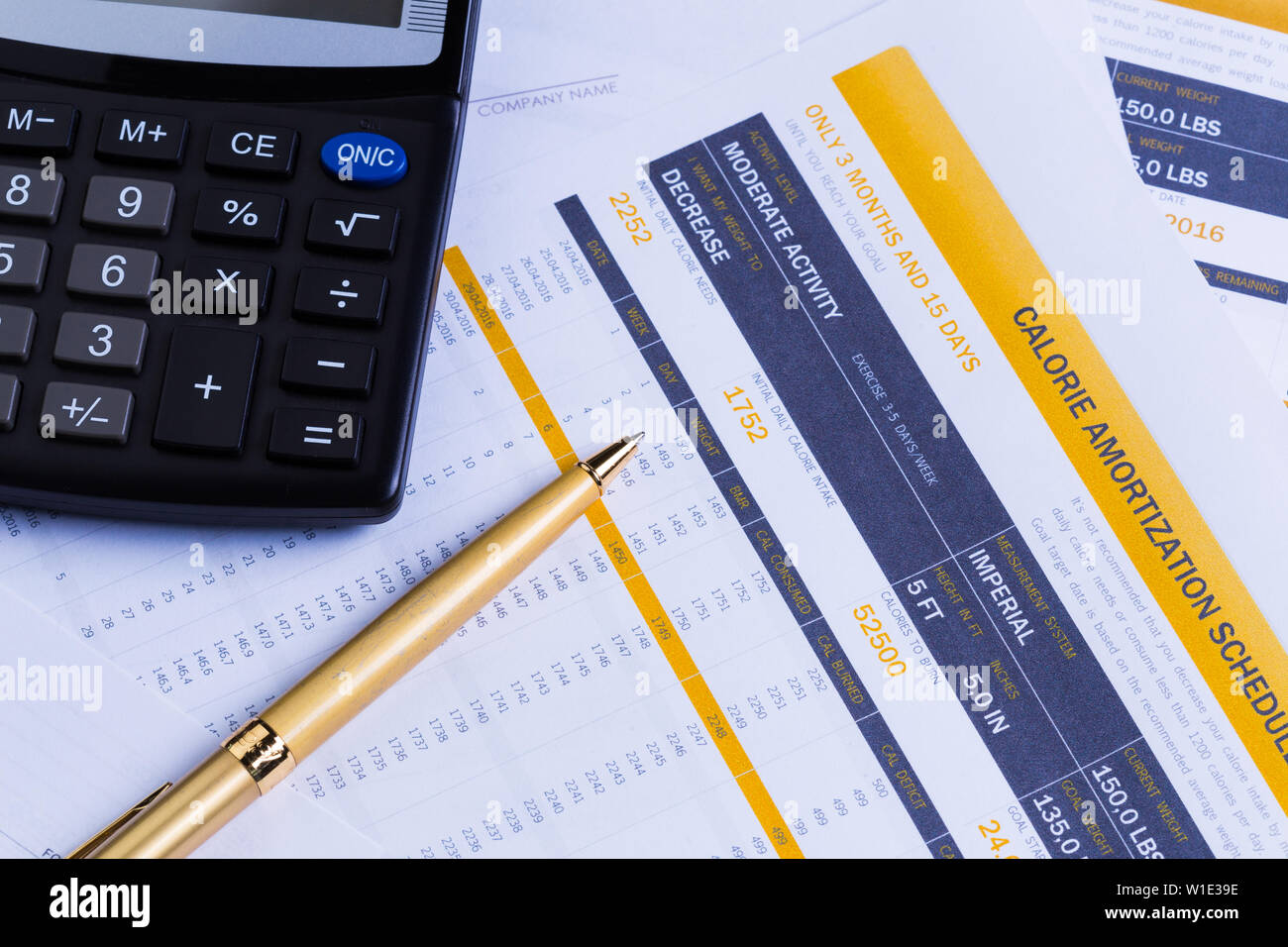 Graphs and Calculator Stock Photo - Alamy