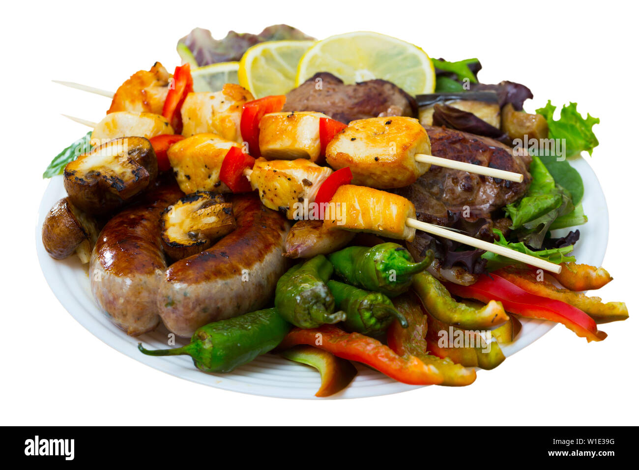 Meshana Scar  a dish of bulgarian cuisine with assortiment meat and vegetables. Isolated over white background Stock Photo