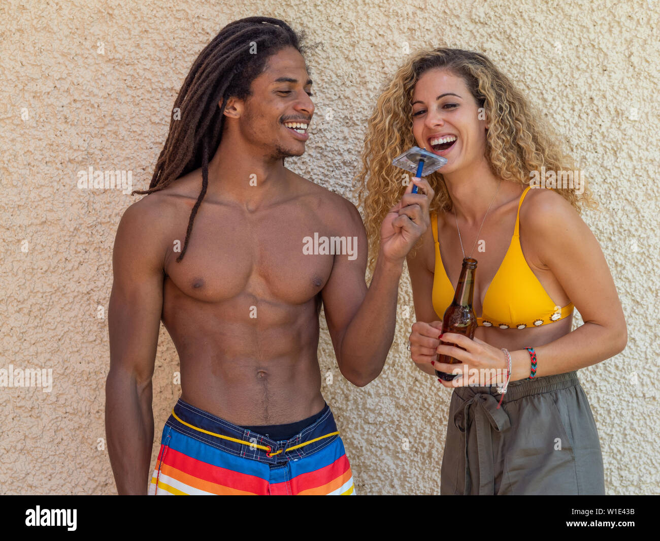 Caucasian Blonde Girl And Black Boy With Dreadlocks Play With A Cassette Tape Stock Photo Alamy Caucasian Blonde Girl And Black Boy With Dreadlocks Play With A Cassette Tape Stock Photo Alamy