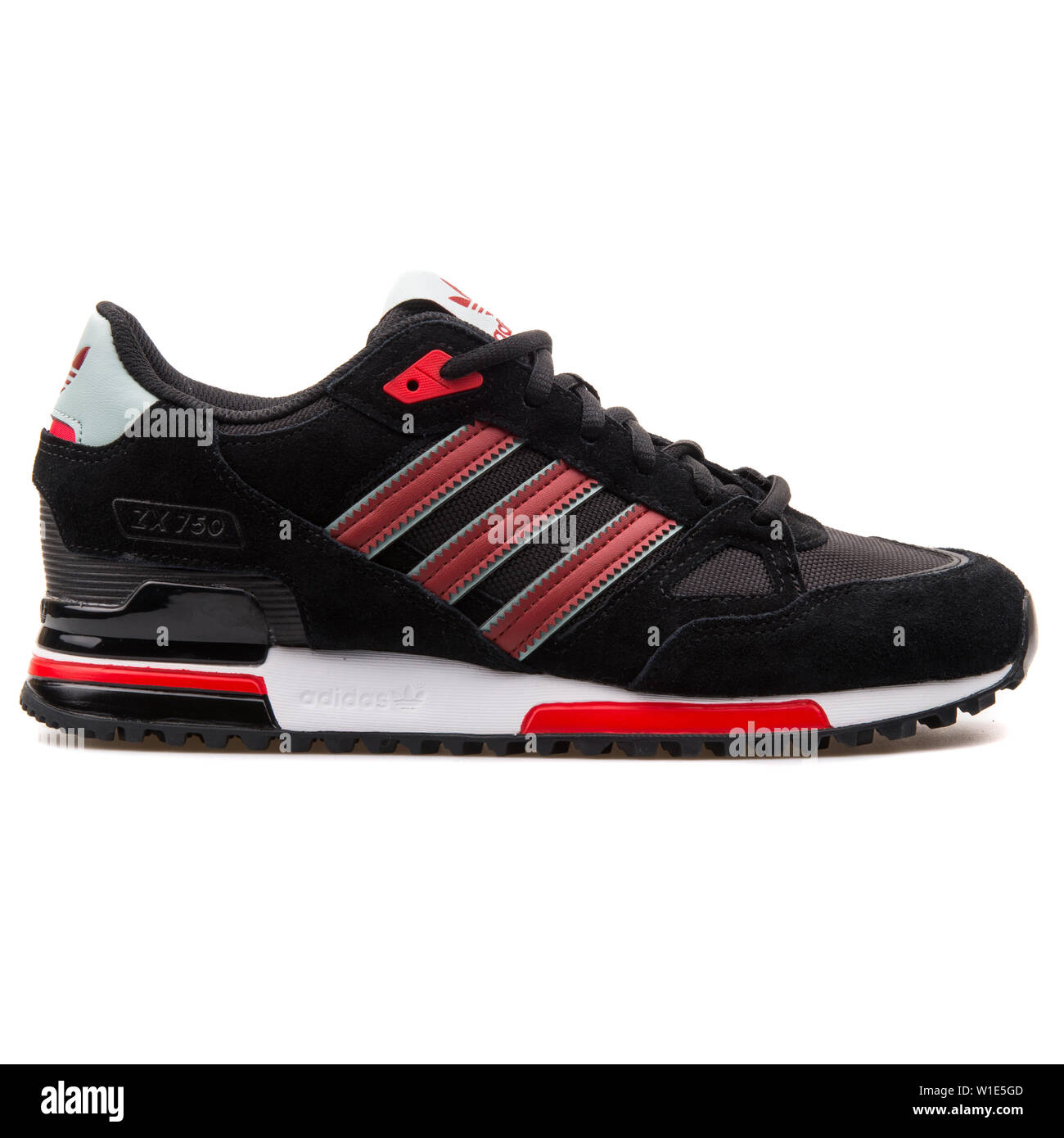 VIENNA, AUSTRIA - AUGUST 25, 2017: Adidas ZX 750 black and red sneaker on  white background Stock Photo - Alamy