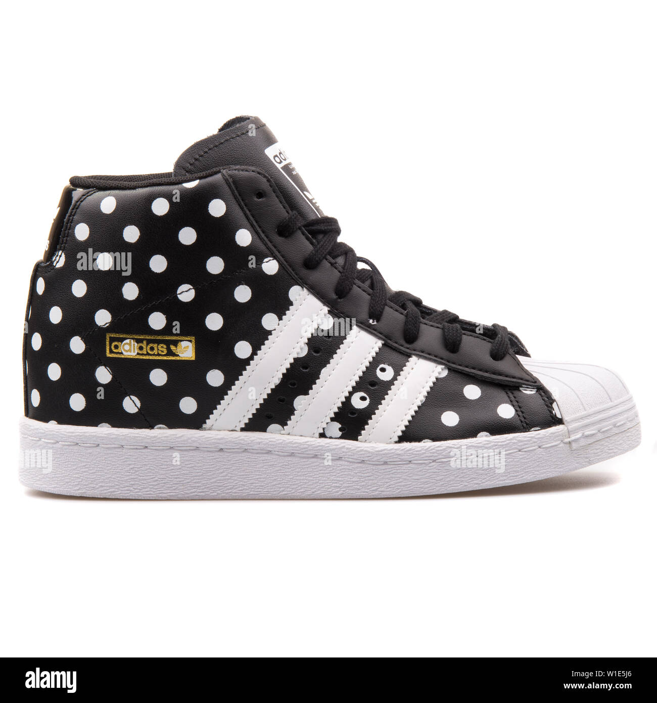 VIENNA, AUSTRIA - AUGUST 25, 2017: Adidas Superstar UP black with white  dots sneaker on white background Stock Photo - Alamy