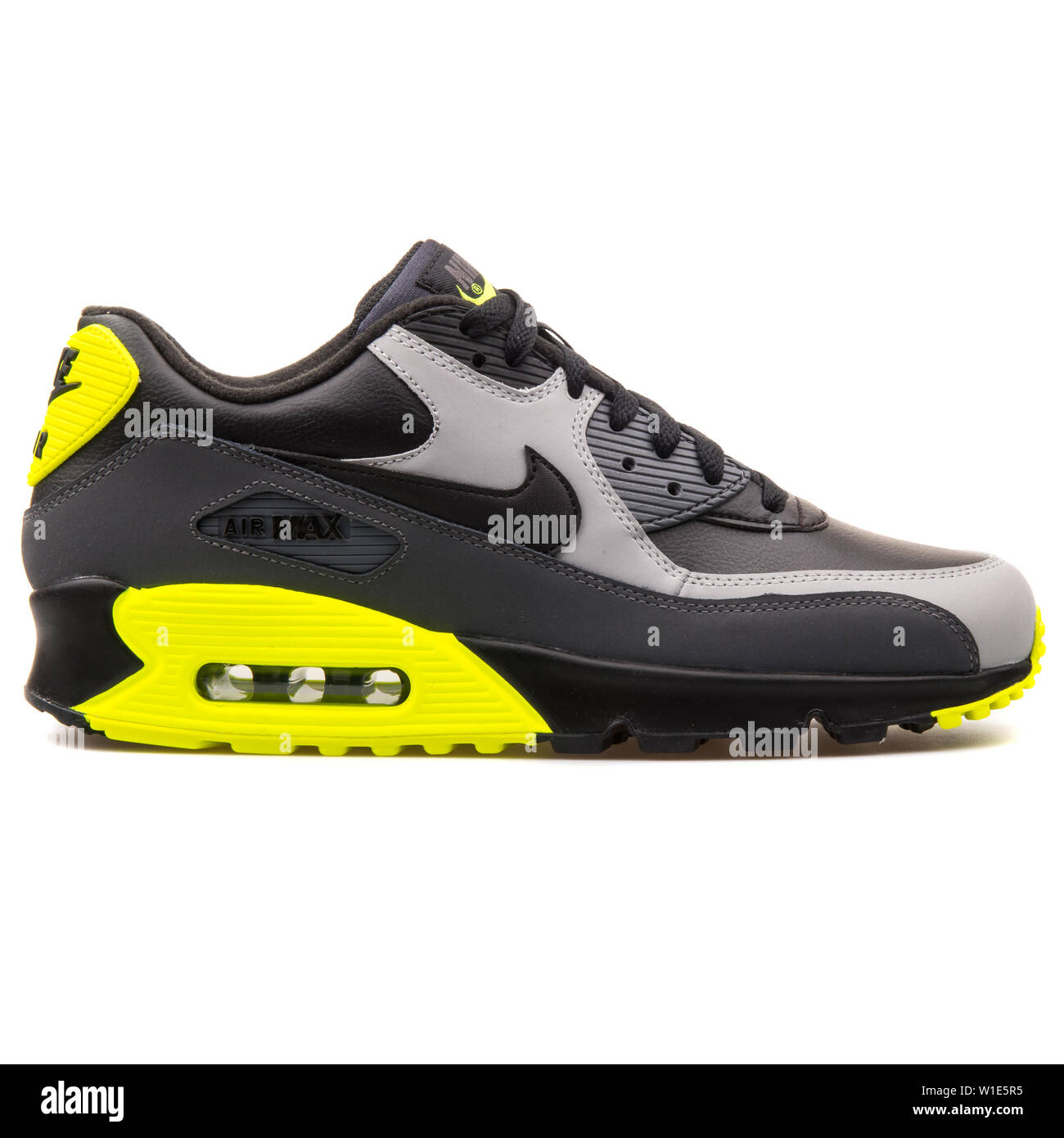VIENNA, AUSTRIA - AUGUST 25, 2017: Nike Air Max 90 Leather black, grey and  yellow sneaker on white background Stock Photo - Alamy