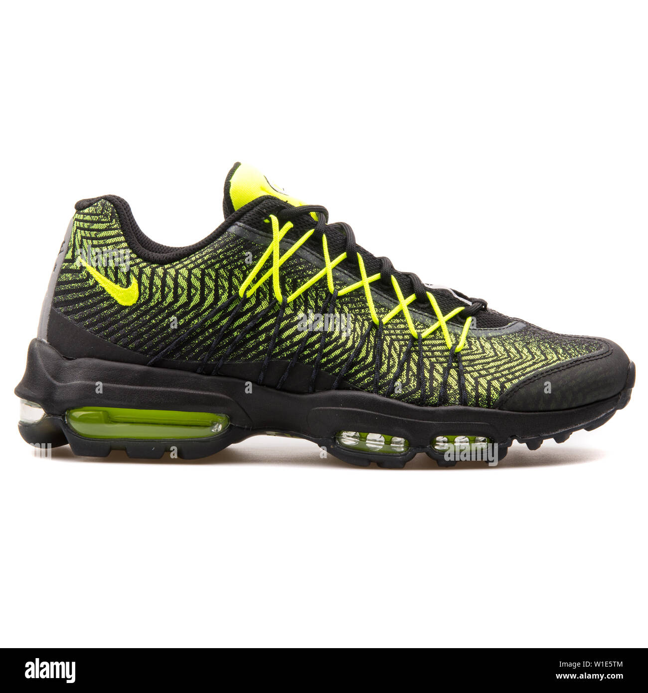 VIENNA, AUSTRIA - AUGUST 25, 2017: Nike Air Max 95 Ultra JCRD black and volt green background Stock Photo - Alamy