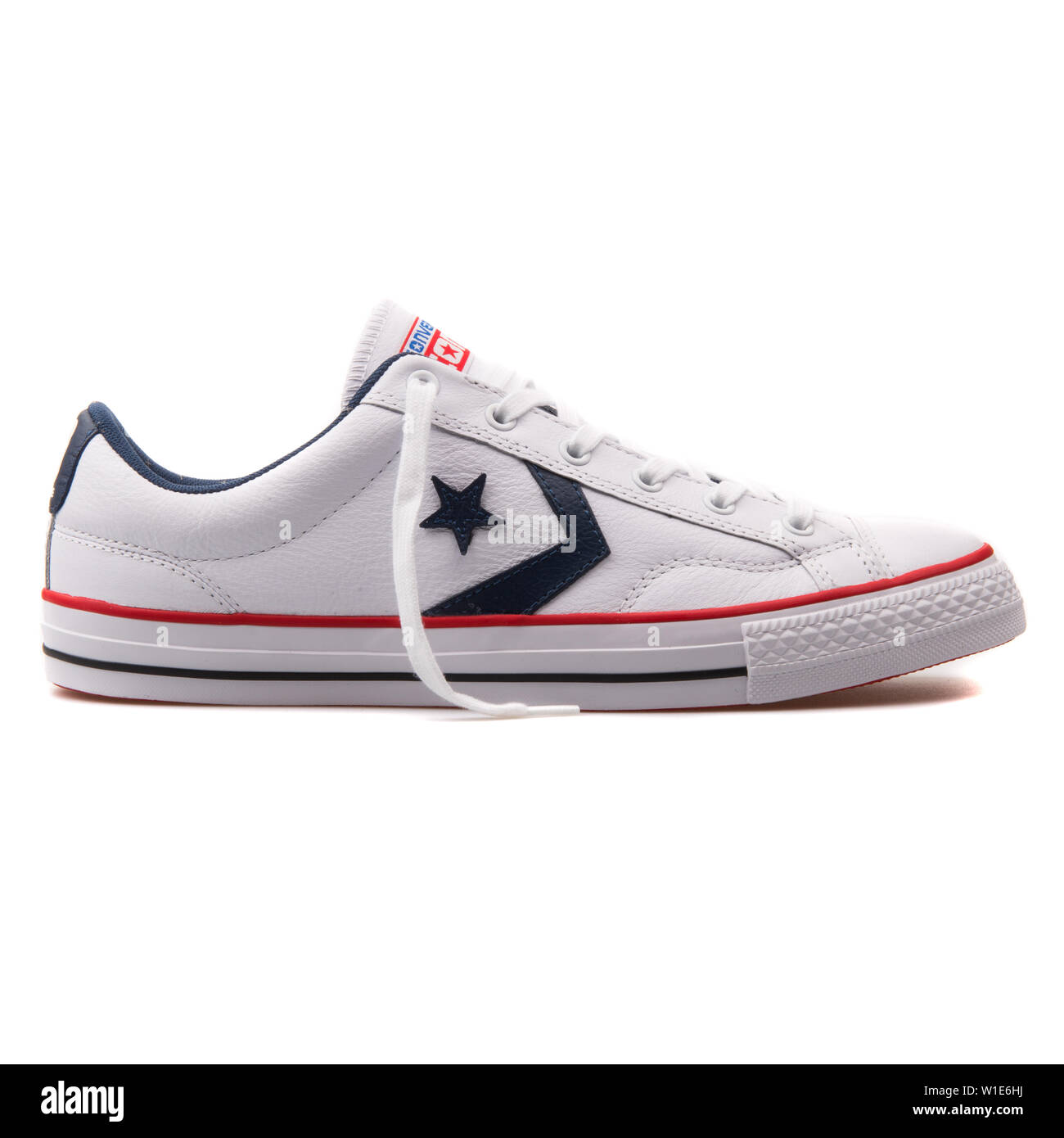 VIENNA, AUSTRIA - AUGUST 25, 2017: Converse Star Player OX white and navy blue sneaker on background Stock Photo -