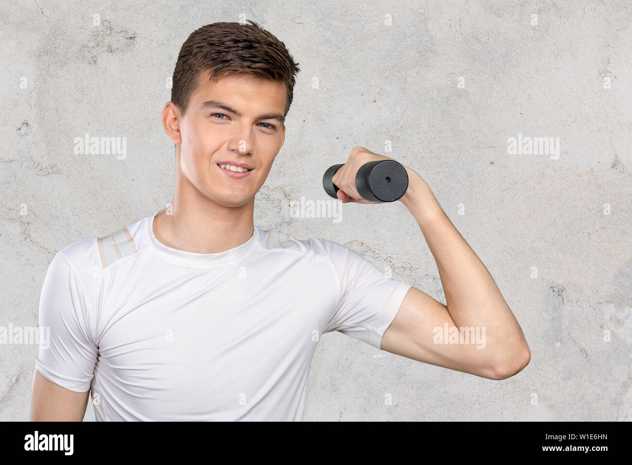 Weak man lifting heavy weight hires stock photography and images Alamy