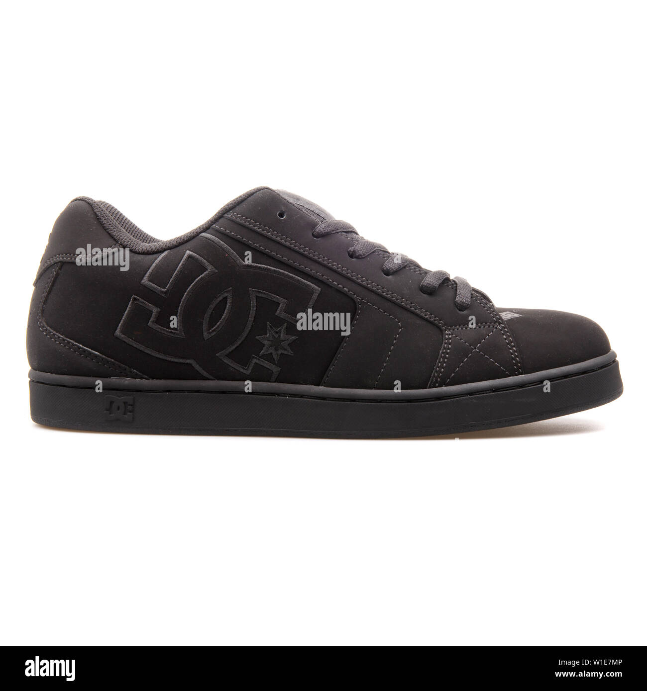 VIENNA, AUSTRIA - AUGUST 25, 2017: DC Net black sneaker on white background. Stock Photo