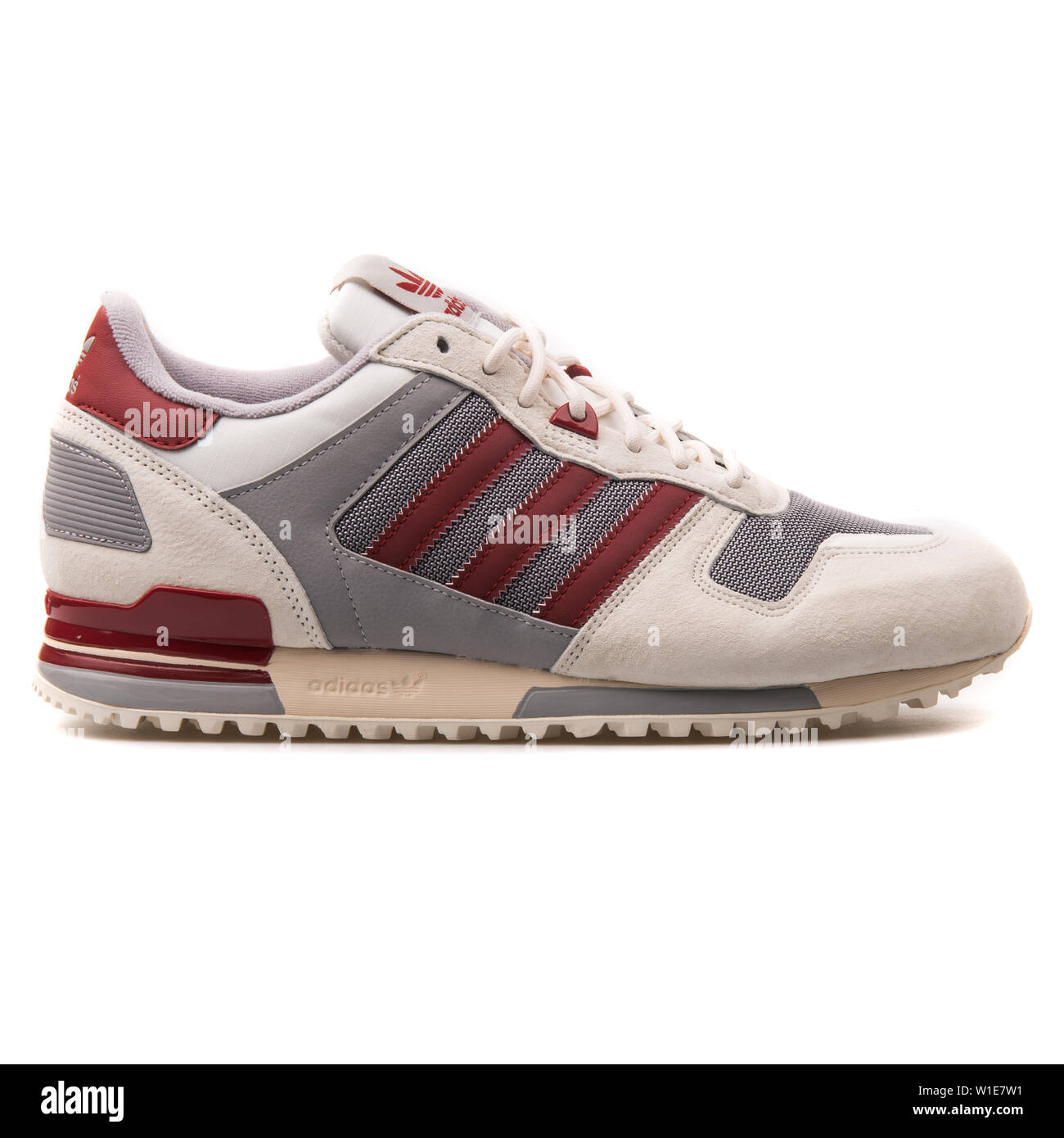 VIENNA, AUSTRIA - AUGUST 25, 2017: Adidas ZX 700 white, grey and red  sneaker on white background Stock Photo - Alamy